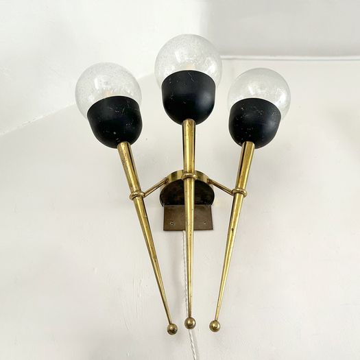 A Large Pair of Mid Century Brass Torch Wall Lights