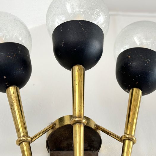 A Large Pair of Mid Century Brass Torch Wall Lights