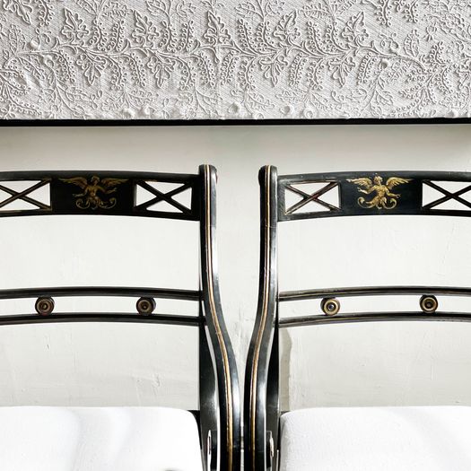 A Pair of Regency Style Ebonised and Decorated Armchairs