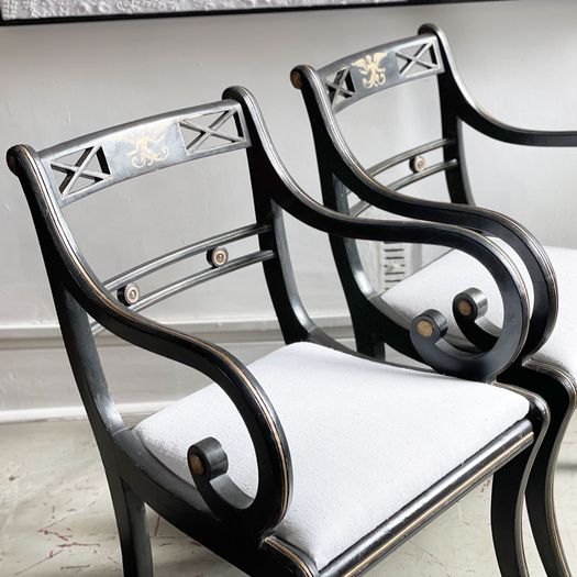 A Pair of Regency Style Ebonised and Decorated Armchairs