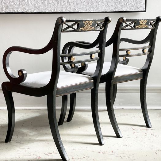 A Pair of Regency Style Ebonised and Decorated Armchairs