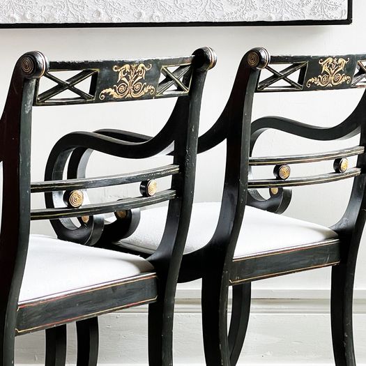 A Pair of Regency Style Ebonised and Decorated Armchairs