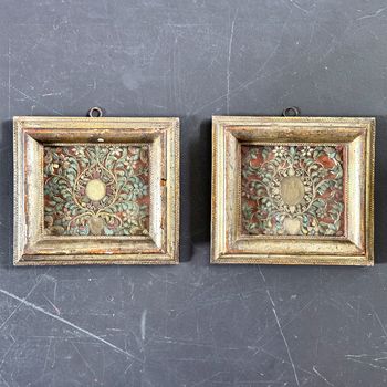 A Pair of 18th Century Italian Paperolles in Gilt Wood Frames