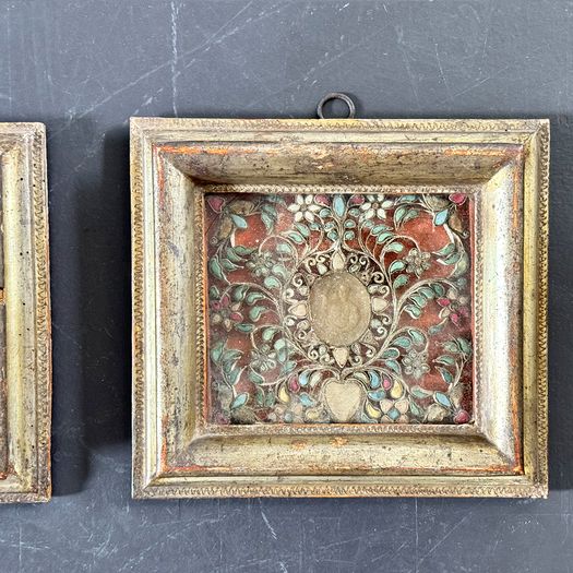 A Pair of 18th Century Italian Paperolles in Gilt Wood Frames