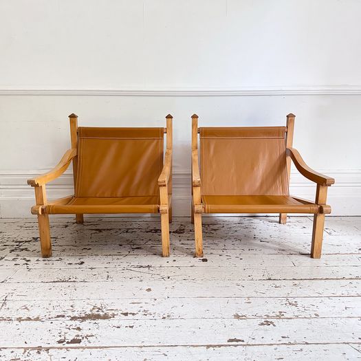 A Pair of 1960's Spanish Leather Sling Armchairs