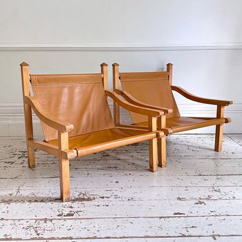 A Pair of 1960's Spanish Leather Sling Armchairs