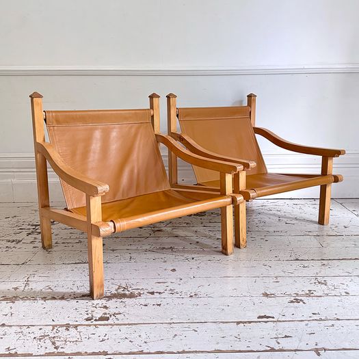 A Pair of 1960's Spanish Leather Sling Armchairs