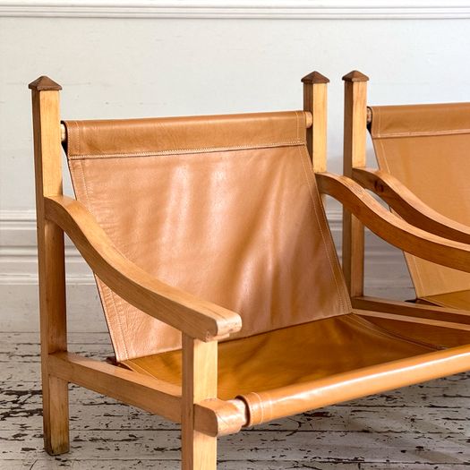A Pair of 1960's Spanish Leather Sling Armchairs