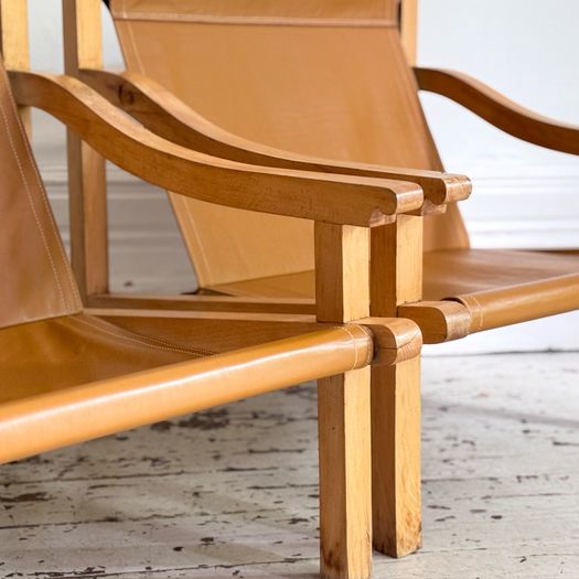 A Pair of 1960's Spanish Leather Sling Armchairs