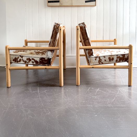 A Pair of 1970's Italian Lounge Armchairs with Cowhide Upholstery