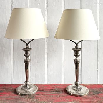 A Pair of Silver Plated Regence Candlestick Table Lamps
