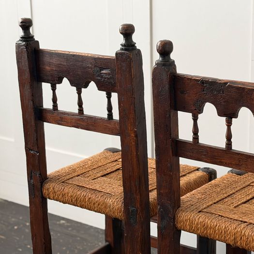 A Set of Six Antique Carved Folk Art Pyrenean Chairs with Woven Seats
