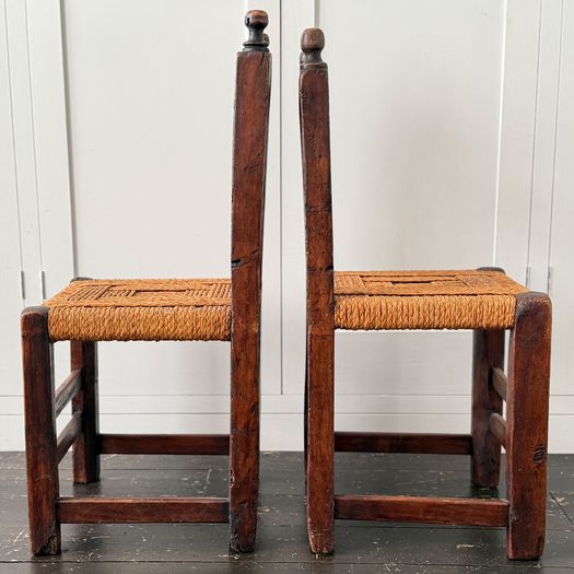 A Set of Six Antique Carved Folk Art Pyrenean Chairs with Woven Seats