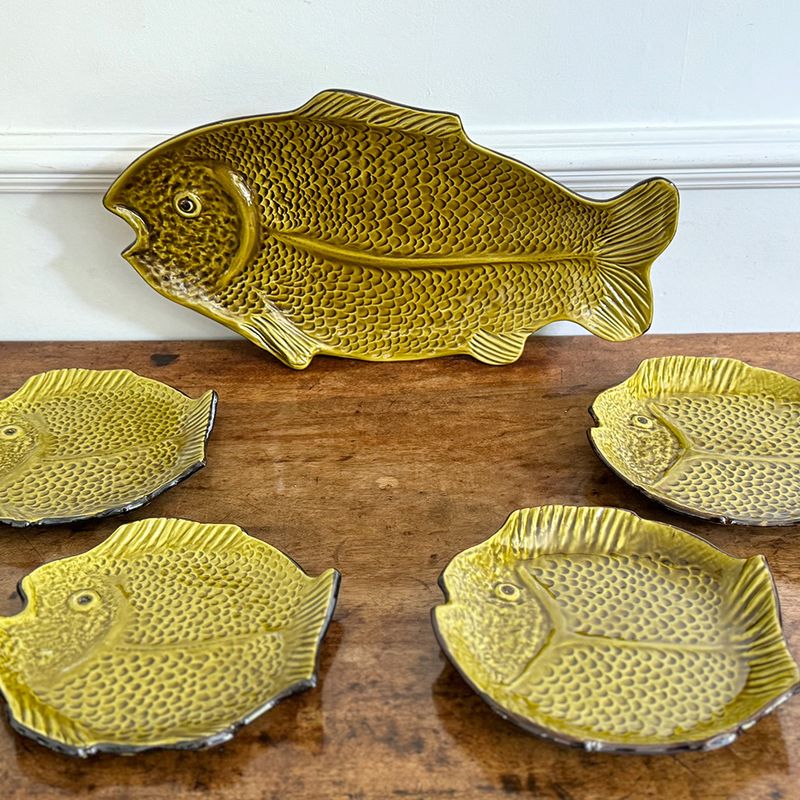 A Large Set of Green Vallauris Style Fish Plates, Bowls & Platter
