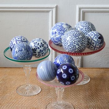 A collection of ten vintage Bombay Company blue & white ceramic carpet balls