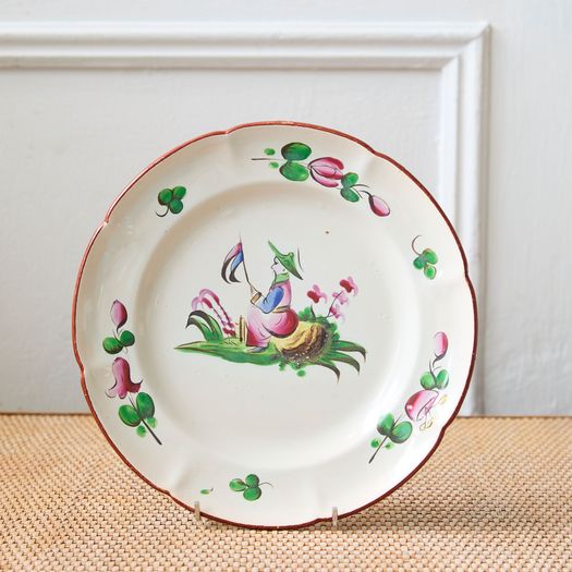 A set of four late 18th / early 19th century French faience hand-painted polychrome decorated Chinoiserie plates