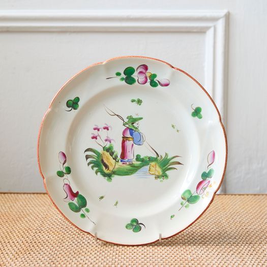 A set of four late 18th / early 19th century French faience hand-painted polychrome decorated Chinoiserie plates