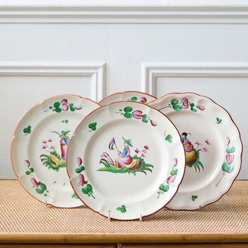 A set of four late 18th / early 19th century French faience hand-painted polychrome decorated Chinoiserie plates