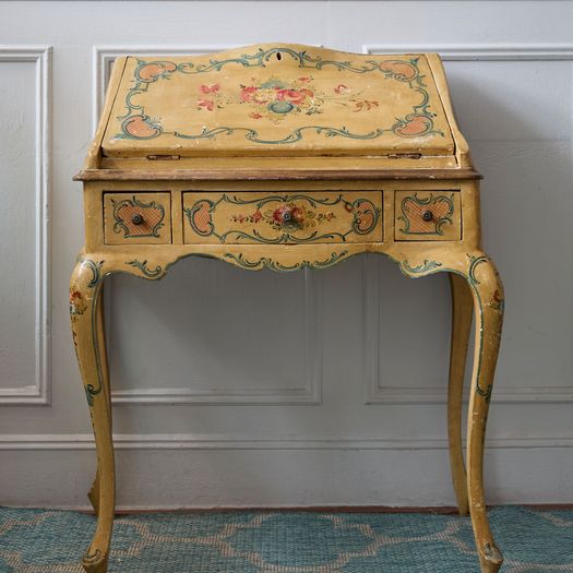 A beautiful mid twentieth century Venetian ladies bureau and matching open armchair