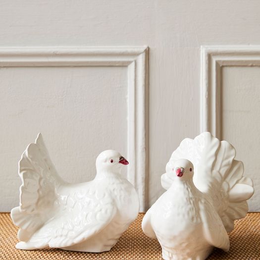 A pair of vintage ceramic dove figurines