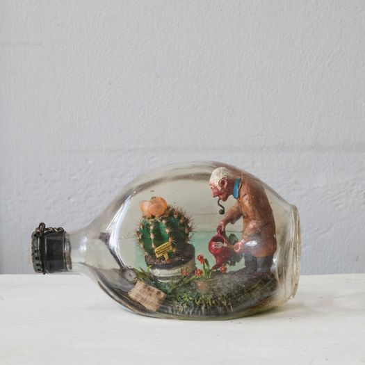 A collection of six vintage 'ships in bottles', each modelled with interior scenes or classic ships made 1950s-1970s