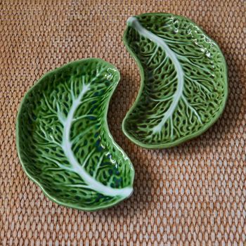 A pair of vintage Portuguese green majolica Bordallo Pinheiro cabbage leaf dishes
