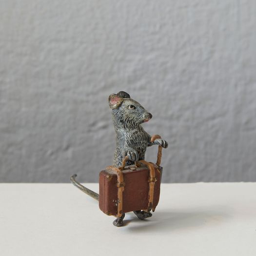 A set of three cold painted metal cast models of pugs, mouse and cats