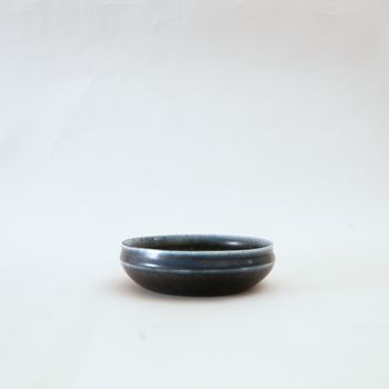 Dark blue shallow bowl by Carl-Harry Stålhane (Swedish, 1920–1990)