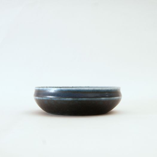 Dark blue shallow bowl by Carl-Harry Stålhane (Swedish, 1920–1990)