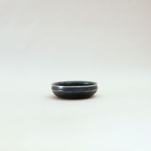 Dark blue shallow bowl by Carl-Harry Stålhane (Swedish, 1920–1990)