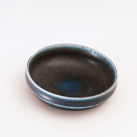 Dark blue shallow bowl by Carl-Harry Stålhane (Swedish, 1920–1990)