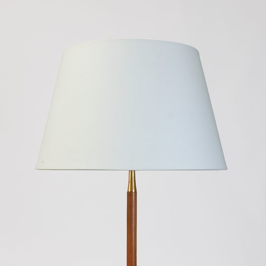 Floor lamp with black metal tripod base