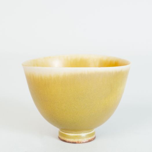 Miniature yellow bowl on foot thrown by Berndt Friberg