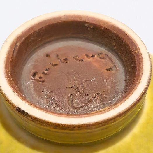 Miniature yellow bowl on foot thrown by Berndt Friberg