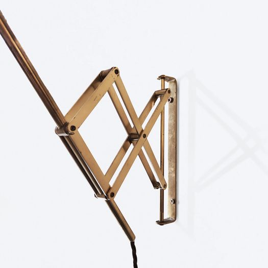 Concertina wall lamp with adjustable head