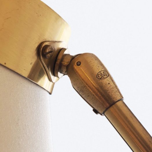 Concertina wall lamp with adjustable head