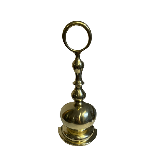 Antique brass doorstop