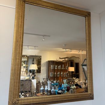 Large ripple frame mirror