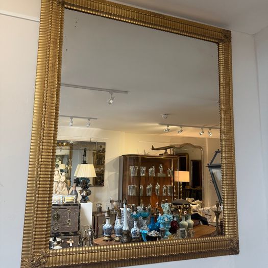 Large ripple frame mirror