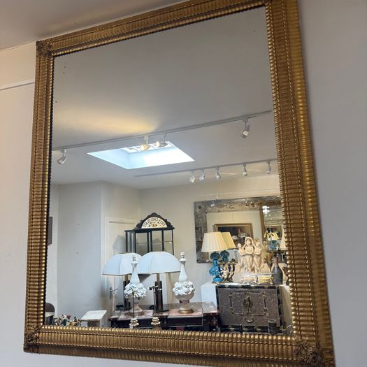 Large ripple frame mirror