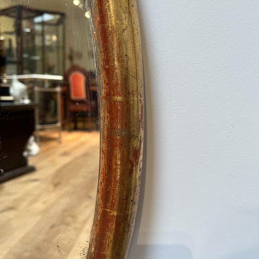 19th century gilt oval mirror
