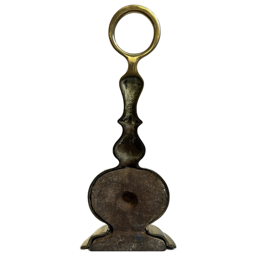 Antique brass doorstop