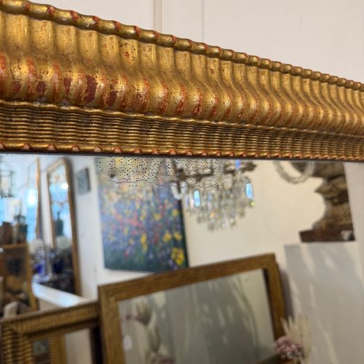 Large ripple frame mirror