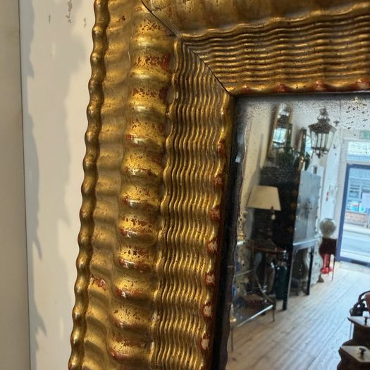 Large ripple frame mirror