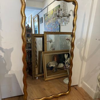 Large wavy edge mirror