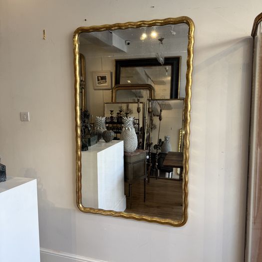 Large French wavy edge gilt mirror