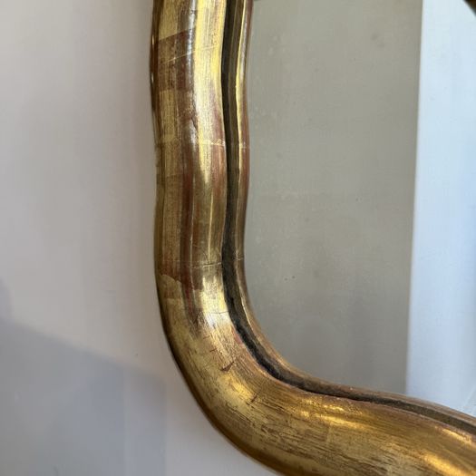 Large French wavy edge gilt mirror