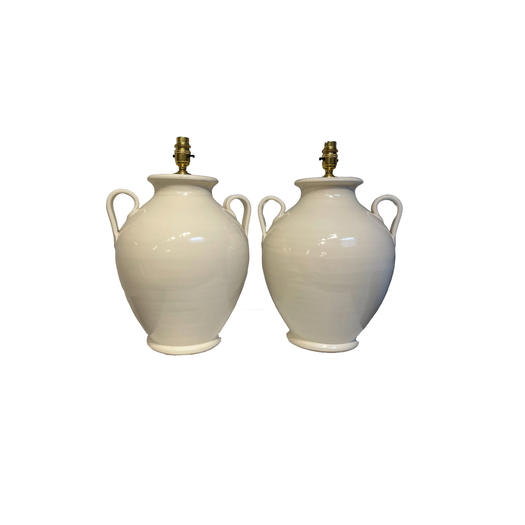 Large pair of white glazed lamps