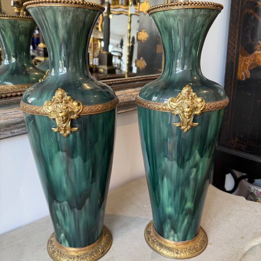Large pair of mottled green glazed vases