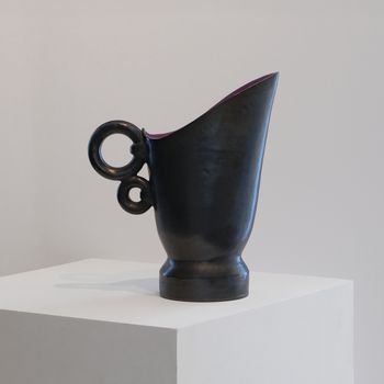 A Black Ceramic Jug